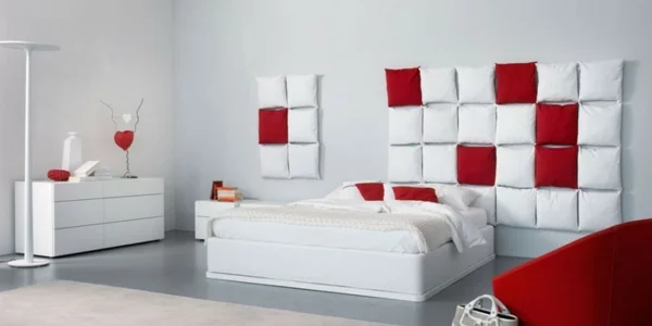 Minimalistische rote Schlafzimmer kissen weiß wand bequem