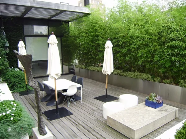 dachterrassengestaltung holz terrassen dielen lebendiger zaun balkonpflanzen