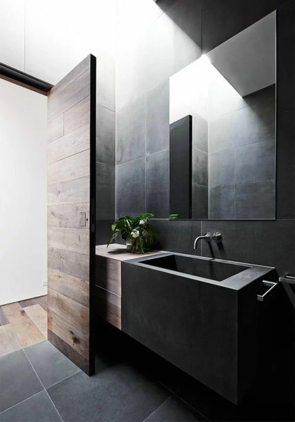 modernes badezimmer schwarze einrichtung pflanzen