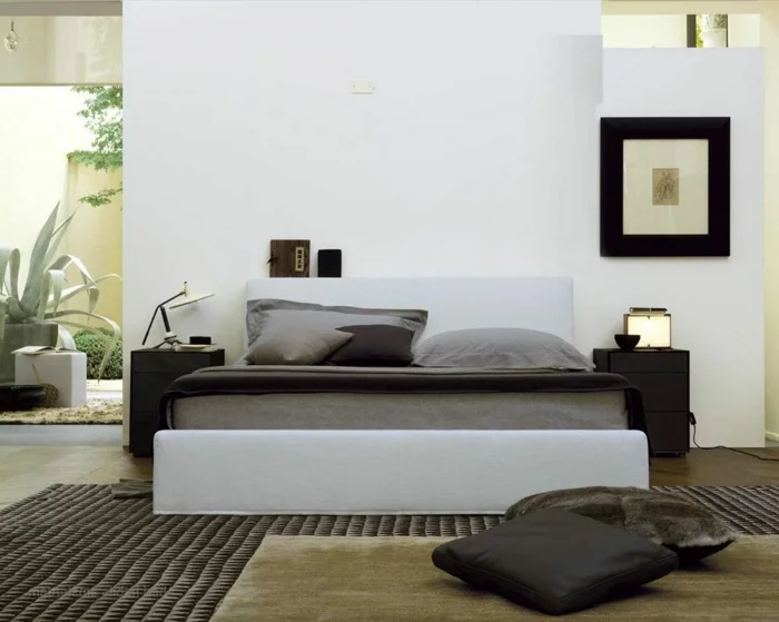 schlafzimmer einrichten schlicht stilvoll teppich bodenkissen