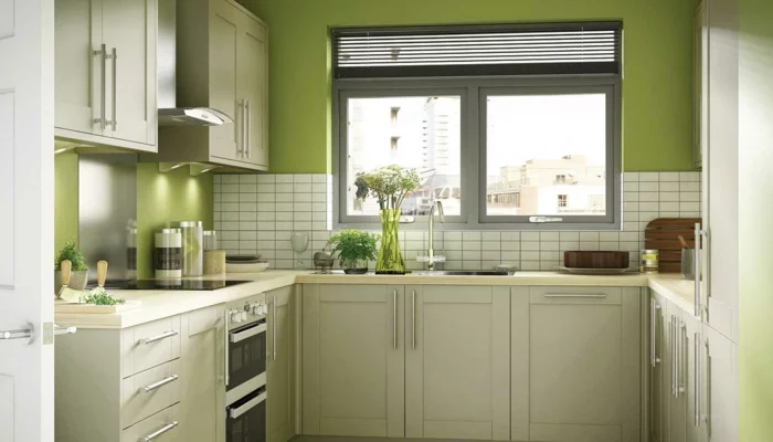 wandgestaltung küche grün weiße wandfliesen blumen fenster