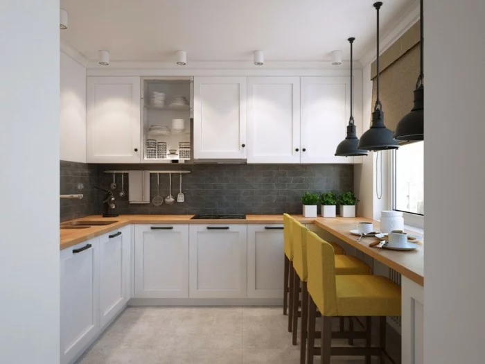 wohnideen küche kleine küchenzeile mit grauen wandfliesen und weißen küchenschränken