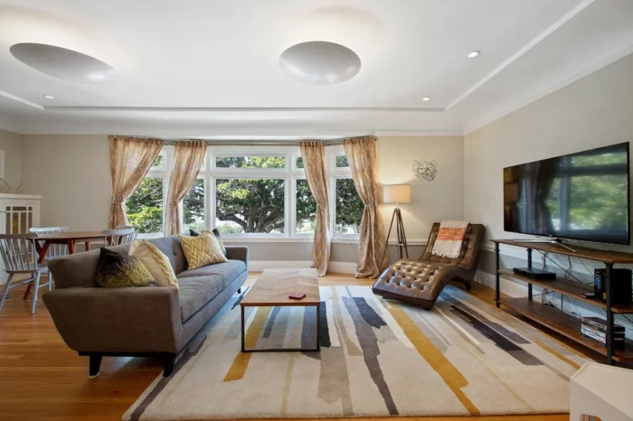 moderne sessel wohnzimmer einrichten stilvoller teppich ledersessel