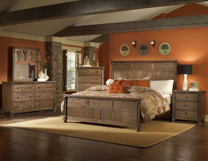 wohnideen schlafzimmer teppich orange wände hölzerne möbel