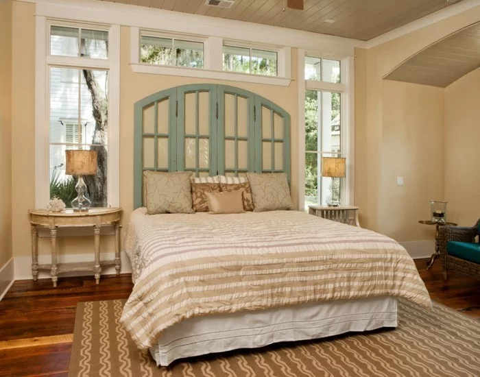 schlafzimmer gestalten rustikale elemente grünes bettkopfteil teppich