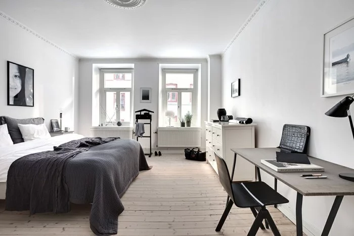skandinavisch wohnen holzboden weiße wände elegante bettwäsche