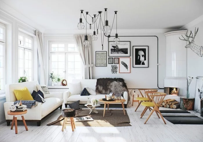 skandinavisch wohnen wohnzimmer einrichten wandbilder lange gardinen holzboden