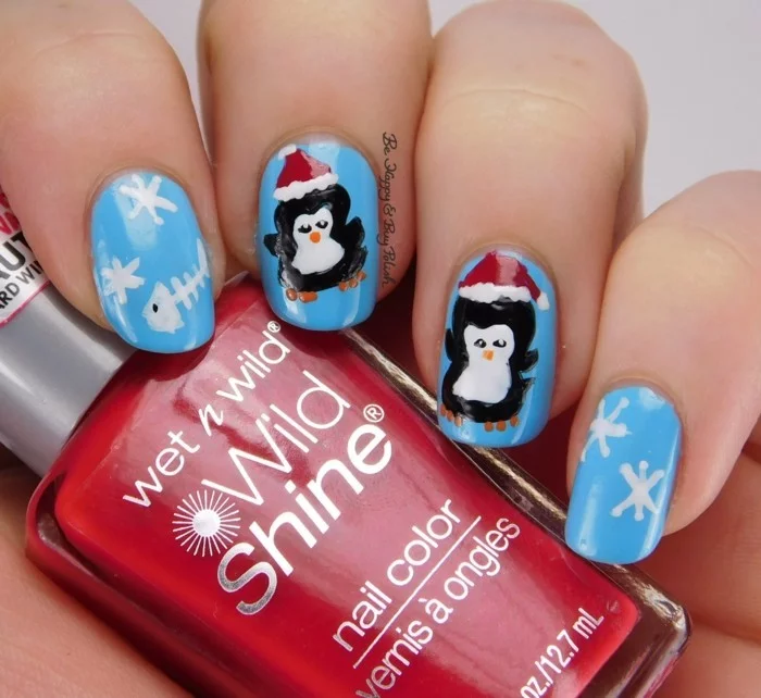 nageldesign winter weihnachtsmotive festliche fingernaegel piguinen