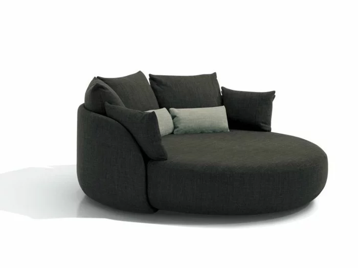 rundes sofa elegantes design dunkelgrau dekokissen