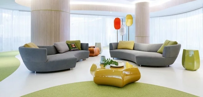 rundes sofa graue rundsofas ausgefallener gelber couchtisch schöner bodenbelag