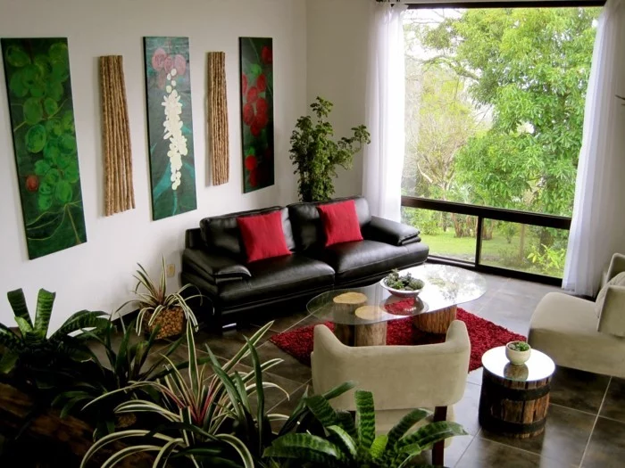 pflanze mit großen blättern frisches innendesign wohnzimmer rote akzente