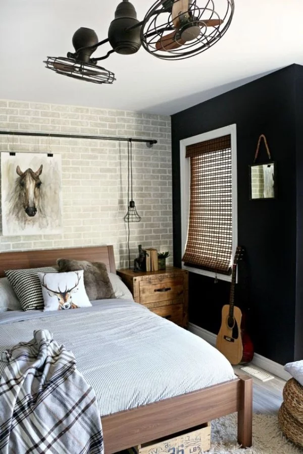 Backsteinwand im Schlafzimmer Grau im Kontrast zu Schwarz herrscht in der ganzen Raumgestaltung